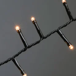 Micro LED Bueschellicherkette Cluster schwarz 30V Innentrafo 200 bernsteinfarbene Dioden^Konstsmide Hot